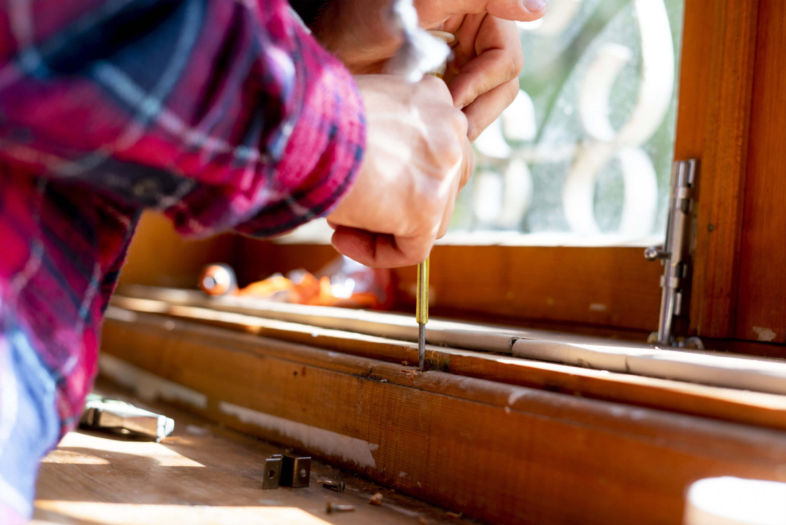 close up male worker carpenter repairing and cleaning wooden surface with professional tools close up male worker carpenter repairing and cleaning wooden surface with professional tools